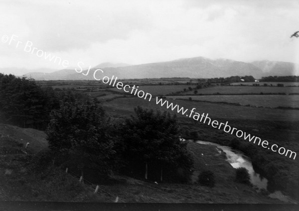 COOMERAGH MTS FROM TRAIN LEAVING KILMACHOUGH